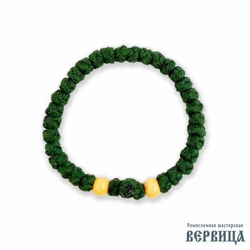 Крупный план узлов тёмно-оливкового комбоскини вид сверху